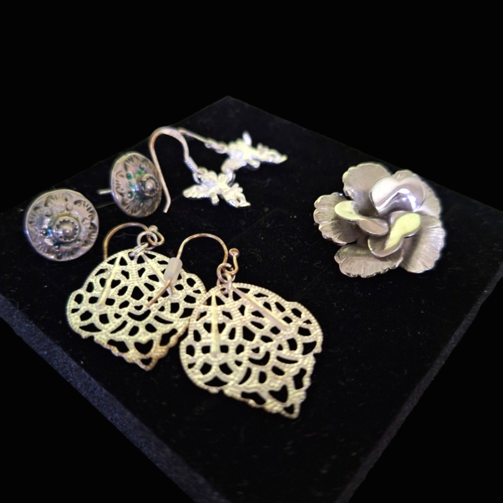 A collection of 3 Pairs Of Earrings And Vintage Rose Pendent.